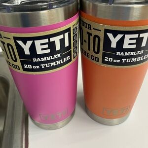 YETI Rambler 20 oz Tumblers in Pink and Orange